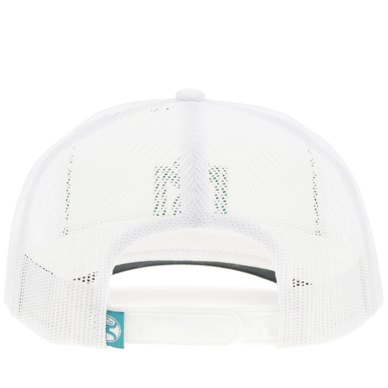 back of white on white hat with green logo patch on front