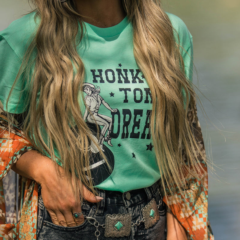 Honky Tonk Dreams mint tee with black logo on model