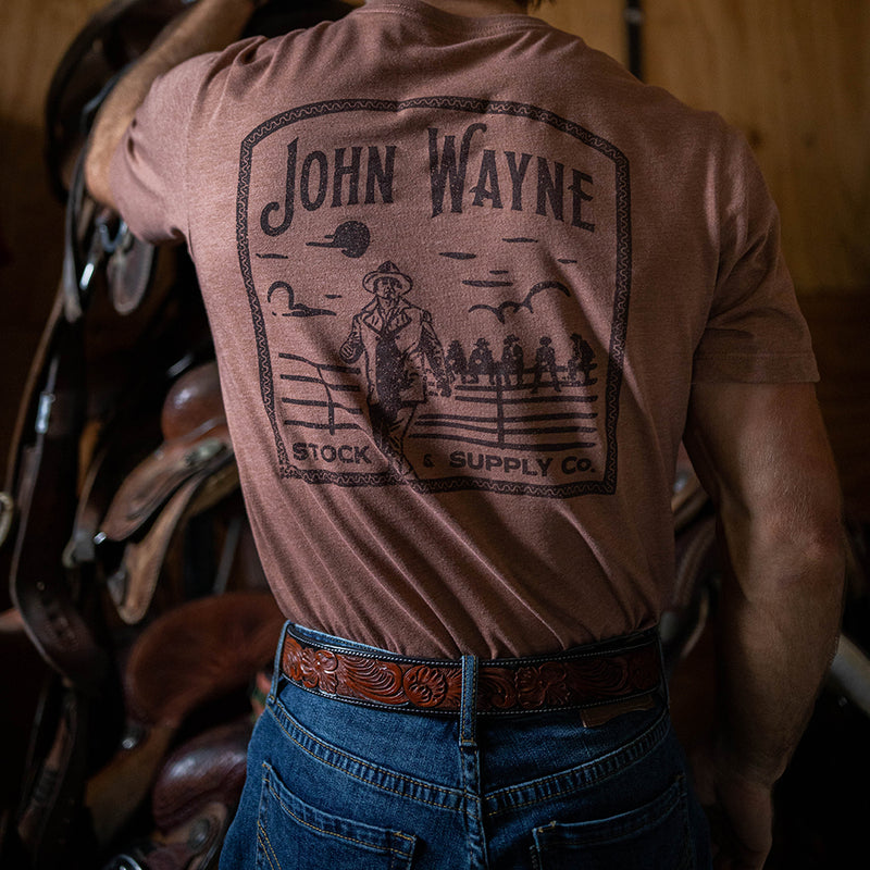 back of the john wayne light brown tee on a model