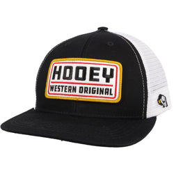 front of black and white Hooey western Original cap with gold, red, white, black patch