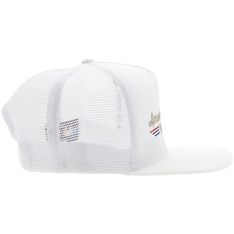 the right side of American Made Cap Co hat in white with red, blue, and gold embroidered details