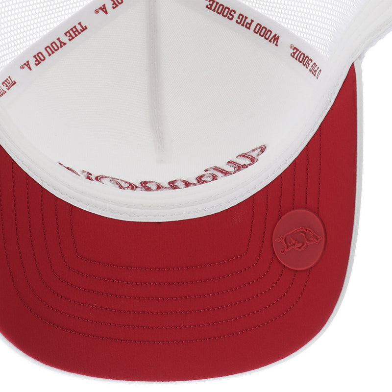 under side of red and white Arkansas x Hooey hat