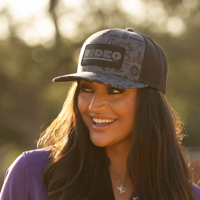 female model posing in grey hooey hat