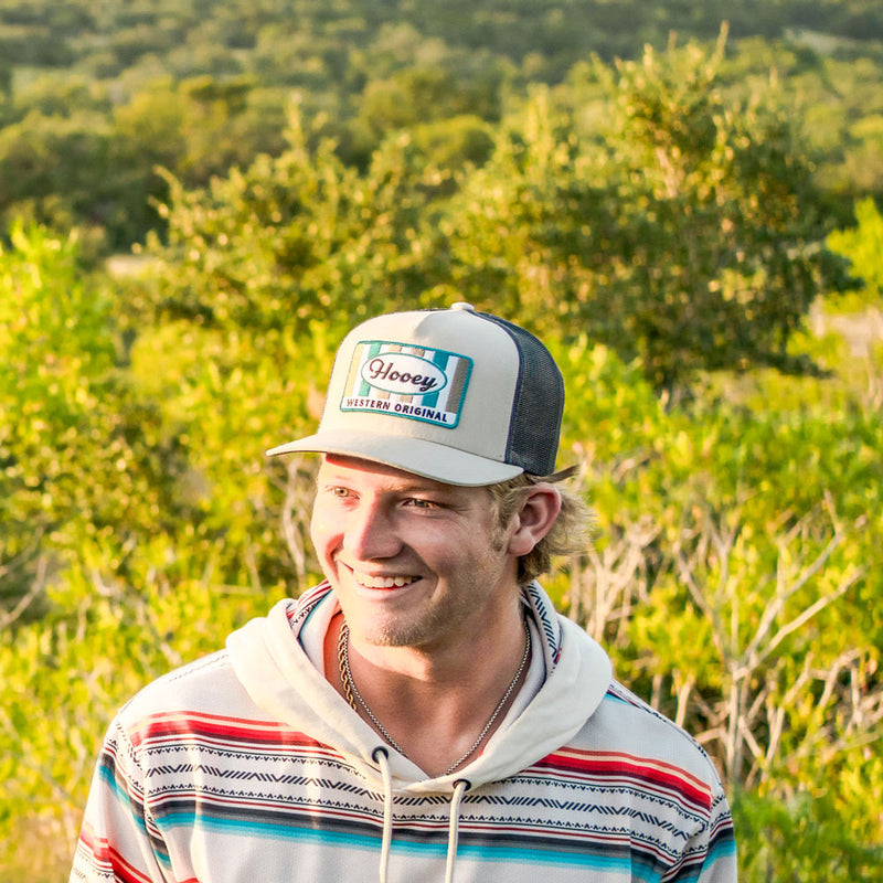 male model posing in hooey golf gear