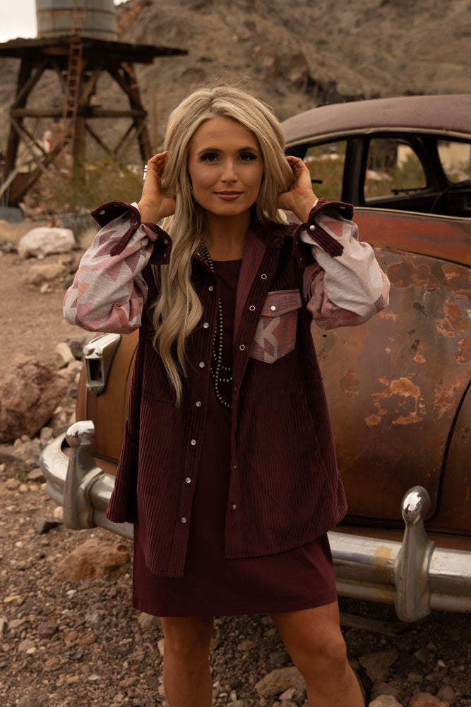 female model wearing burgundy bamboo dress and matching jacket