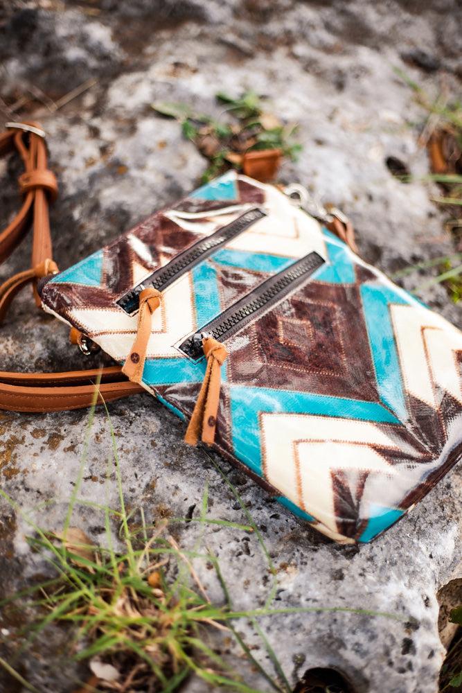 white, teal, brown chevron cross body