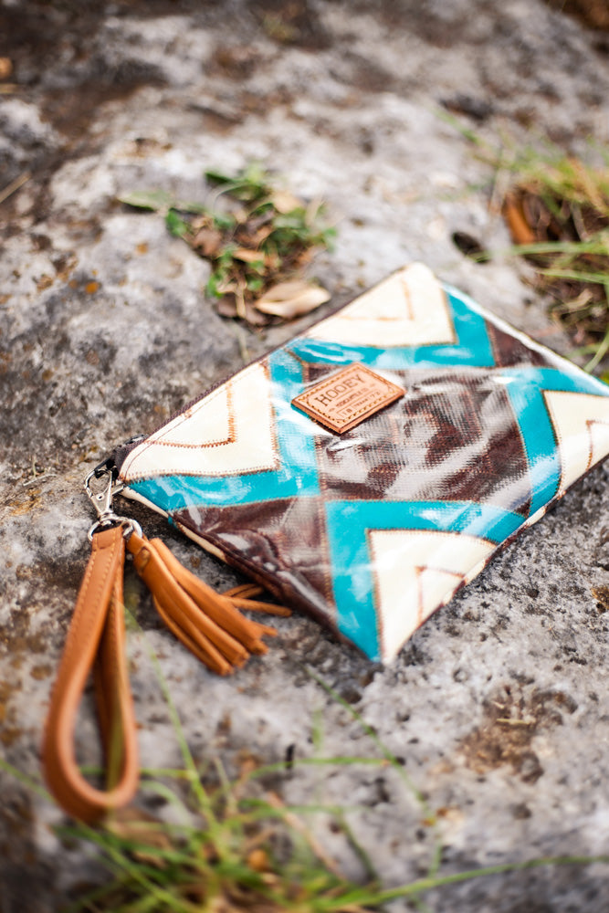 white, brown, teal chevron wristlet