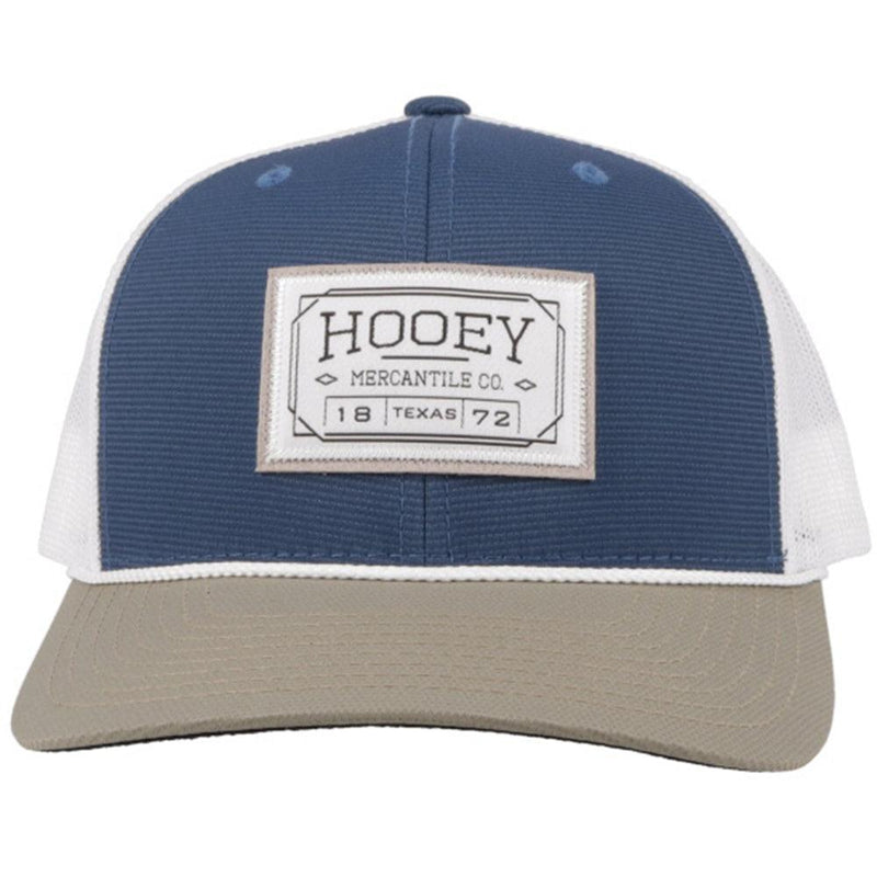 front of the blue, white, and tan snapback hat with white patch and rope