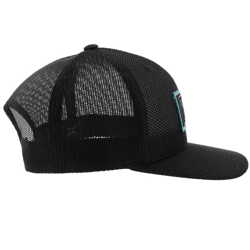 right side of the Dock black on black hat with teal and black patch