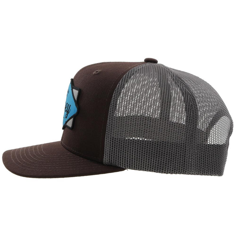 left side of the Youth Diamond brown and grey hat with blue, black, and grey patch