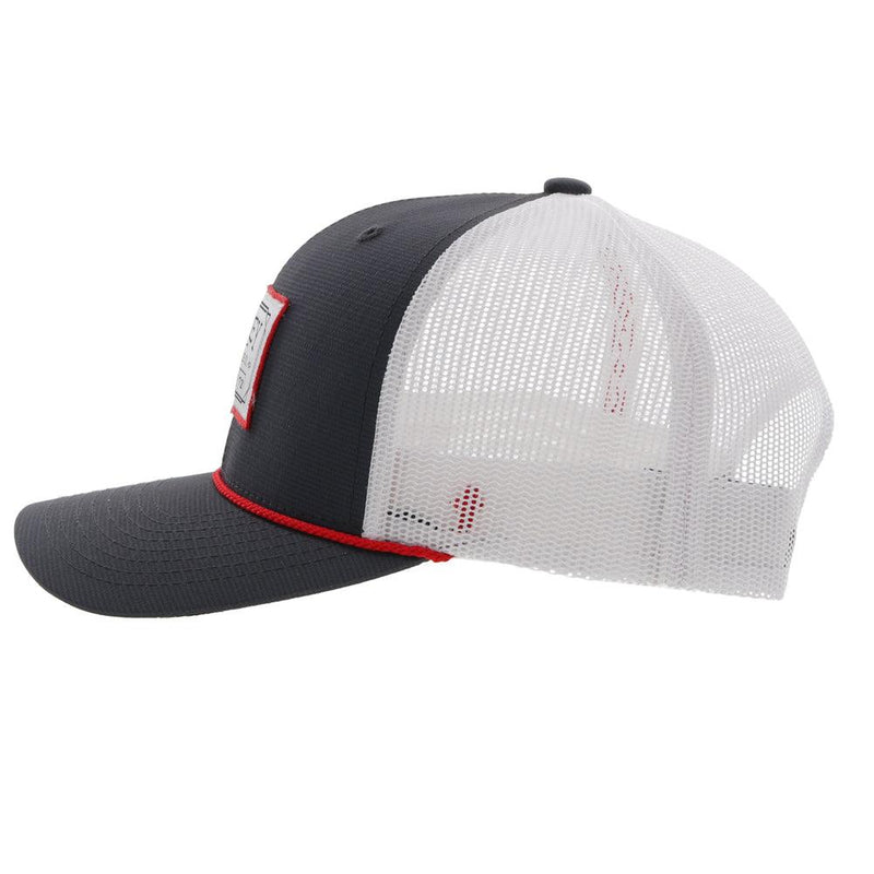 left side of the Doc grey and white trucker hat with red and white patch and red rope detail